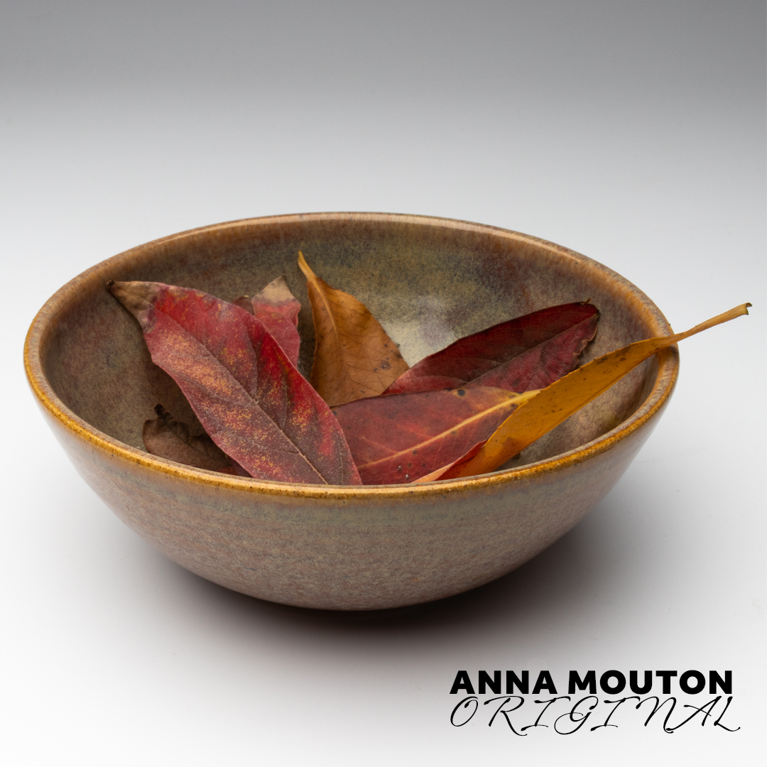 Ceramic bowl of autumn leaves. Photo by Anna Mouton.